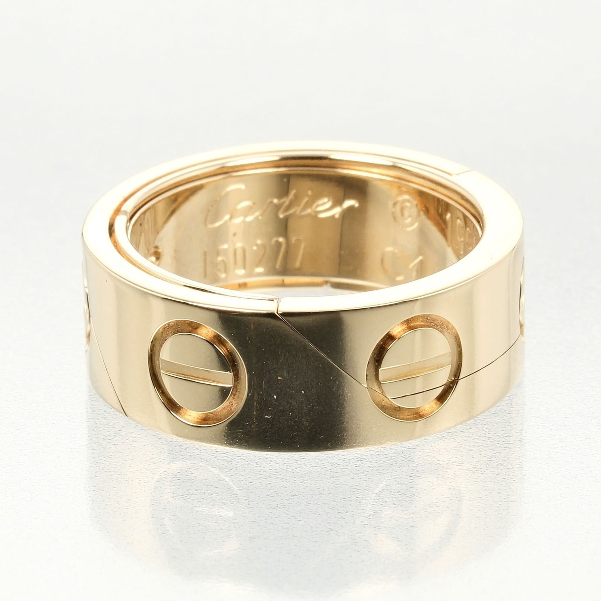 Pre-Owned Cartier Astro Love size 9 ring,   yellow gold, approx. 11.68g  (Good)